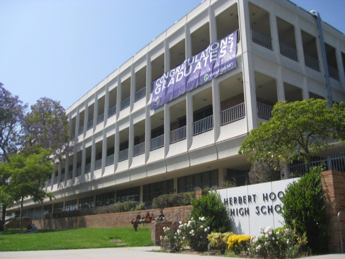 Front gates of Hoover High with Hoover sign.